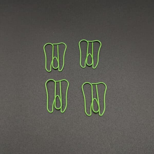 Tooth Shaped Metal Paperclips In A Can